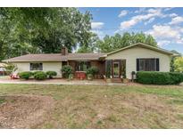 Charming one-story home with well-maintained landscaping and inviting front entrance at 4322 Russell Rd, Graham, NC 27253