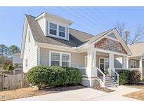 Charming home with a classic front porch and well-maintained landscaping at 2715 Edmund St, Durham, NC 27705