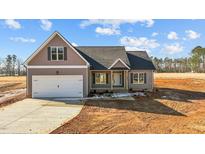 Charming craftsman style home with attached garage and covered porch at 9315 Turkey Way, Middlesex, NC 27557