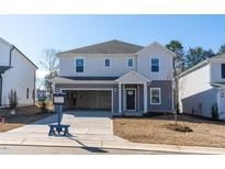 Charming two-story home with a two-car garage and covered entry at 1730 Pie Filling Dr, Haw River, NC 27258
