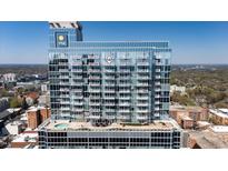 Modern high rise with balconies and rooftop pool offering upscale city living with fantastic views at 301 Fayetteville St # 3205, Raleigh, NC 27601