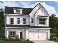 Charming two-story home with white siding, a dormer, and a two-car garage, blending traditional and modern design elements at 3213 Emeline Way # 14, Fuquay Varina, NC 27526