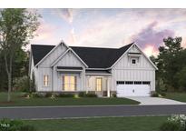 Charming modern farmhouse with white siding, black roof, and inviting front porch at 1212 Opal Ln # 91, Durham, NC 27705
