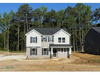 Two-story home with gray siding, black shutters, and a covered front porch on a tree-lined lot at 1803 Ballard Rd # Holly Craftsman, Fuquay Varina, NC 27526