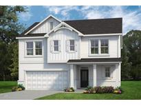 Charming two-story white home with a manicured lawn, attached garage, and inviting curb appeal at 22 Whistling Way # Holly Farmhouse, Lillington, NC 27546