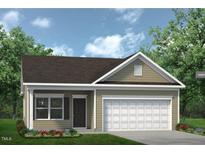 Charming one-story home with a well-manicured lawn and an attached two-car garage at 242 Deodora Ln, Cameron, NC 28326