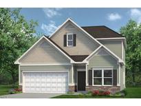 Charming two-story home with attached two car garage and stone accents at 72 E Victory View Ter, Smithfield, NC 27577