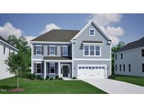 Charming two-story home with gray siding, dark shutters, and a two-car garage at 225 Savannah Moss Way # 120, Raleigh, NC 27603