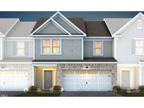 Charming new construction home with light grey brick accents and a two-car garage at 281 Broomside Ave, Raleigh, NC 27603
