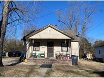 Charming single story home with cozy front porch, perfect for relaxing outdoors at 691 Adams St, Henderson, NC 27536