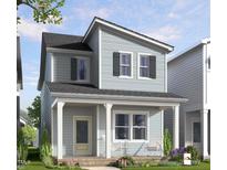 Charming two-story home with a welcoming front porch and neatly landscaped front yard at 928 Allen Park Dr, Raleigh, NC 27604