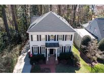 Two-story home featuring a brick pathway and a well-maintained front yard at 2725 Rosedale Ave, Raleigh, NC 27607
