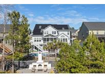 A spacious two-story home featuring a beautiful backyard pool, a fireplace and solar panels on the roof at 3633 Jordan Shires Dr, New Hill, NC 27562