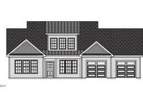 Charming single-story home featuring a symmetrical facade and a multi-car garage at 414 Springtooth Dr, Zebulon, NC 27597
