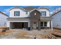 Under construction: Two-story home with brick front, white siding, and attached garage at 2114 Cherry Creek Rd, Haw River, NC 27258