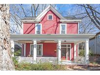 Charming two-story home with a cozy front porch and classic architectural details at 516 N Bloodworth St, Raleigh, NC 27604