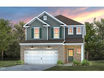 Charming two-story home featuring a brick facade, attached two-car garage, and a well-manicured lawn at 517 Providence Springs Ln, Fuquay Varina, NC 27526