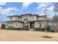 Stunning two-story home with modern architecture and manicured landscaping at 809 Journeys Rest Ln, Apex, NC 27523
