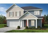 Charming two-story home showcasing diverse siding, balanced shutters and a two car garage at 140 Gobbler Dr, Smithfield, NC 27577