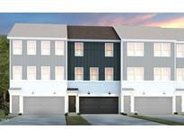 Townhome exterior featuring three units, garages, and hardiplank siding in a modern design at 1408 Chrysalis Pl, Apex, NC 27502