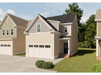 Charming exterior elevation of a two-story home with an attached garage and manicured lawn at 1020 Harper Rd, Raleigh, NC 27603