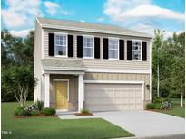 Charming two-story home with a covered front porch and attached garage, surrounded by lush landscaping and a well-manicured lawn at 1148 Solace Way, Rolesville, NC 27571