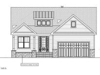 Charming single-Gathering home with a two-car garage and stone accents at 816 Hanson Rd, Durham, NC 27713