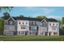 New construction townhome featuring gray siding and trim work at 607 Dorset Stream Dr, Fuquay Varina, NC 27526