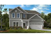 Charming two-story home with gray siding, white trim, and a well-manicured front lawn at 631 Contento Ct, Sanford, NC 27330