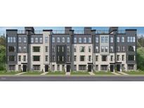 New townhome row showcases gray siding and brick facade, enhancing curb appeal at 10533 Pleasant Branch Dr # 201, Raleigh, NC 27614