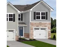 Charming two-story home with gray siding, stone accents, a blue front door, and white garage doors at 225 Elyse Overlook Loop, Sanford, NC 27332