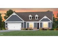 Charming single Gathering home featuring a two-car garage, dormers, and a landscaped front yard at 2404 Del Webb Gardens Dr, Fuquay Varina, NC 27526