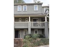Charming two-story condo features balconies, neutral paint, and well-maintained landscaping at 704 Martin Luther King Jr Blvd # D12, Chapel Hill, NC 27514