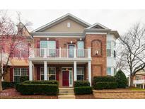 Inviting brick townhouse with front porch and balcony at 9221 Calabria Dr # 121, Raleigh, NC 27617