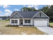 Charming single-Gathering home with stone accents and a two-car garage on a sunny day at 3306 Leaflet Church Rd, Broadway, NC 27505