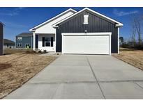 Charming home featuring a spacious two-car garage and a modern exterior design at 1175 Centerview Dr, Nashville, NC 27856