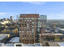 An eye-level view of the Quorum Center and surrounding city buildings showcases a high-rise urban living experience at 122 N Harrington St # 1025, Raleigh, NC 27603