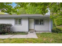 Charming single-story home with light gray siding, updated windows, and a well-kept front yard at 292 Cedar Lake Rd # A, Chapel Hill, NC 27516