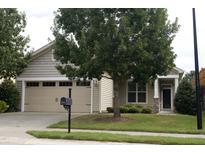 Charming home featuring a well-manicured lawn, a two-car garage, and classic suburban architecture at 8504 Lasilla Way, Raleigh, NC 27616