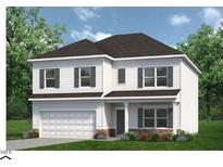 Charming two-story home showcasing classic architectural elements, a manicured lawn, and an attached two-car garage at 131 E Victory View. Ter, Smithfield, NC 27577