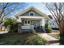 Charming craftsman home with a welcoming front porch and well-maintained landscaping at 632 E Franklin St, Raleigh, NC 27604