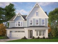 Charming two-story home featuring a two-car garage and beautifully landscaped front yard at 3200 Balcon Ct # 28, Angier, NC 27501