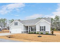 Charming single-Gathering home with attached garage, neutral siding, and well-kept landscaping at 295 Barbour Farm Ln, Four Oaks, NC 27524