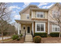 Charming two-story townhouse with stone accents and a welcoming front porch at 4308 Brynwood Ave, Durham, NC 27713