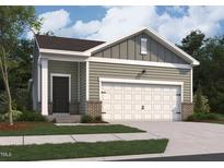 Charming home featuring a two-car garage, Craftsman-style details and a well-manicured lawn at 1128 Solace Way, Rolesville, NC 27571