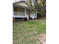 Charming single-story home with inviting front porch and yard at 116 Dunstan Ave, Durham, NC 27707