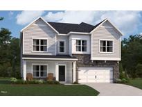 Charming two-story home with stone accents, a two-car garage, and a well-manicured lawn at 108 N Stonemill Trl # Homesite 254, Clayton, NC 27520