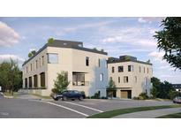 Modern townhome with rooftop gardens offers stylish urban living at 1310 Chamblee Hill Ct, Raleigh, NC 27608