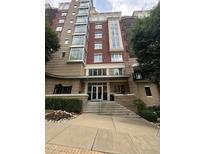 Apartment building with well maintained landscaping and red brick architecture at 618 N Boylan Avenue # 300, Raleigh, NC 27603