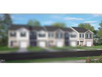 New two-story townhome with attached garage, grey horizontal siding and black shutters at 50 Sweet Meadow Rd, Angier, NC 27501
